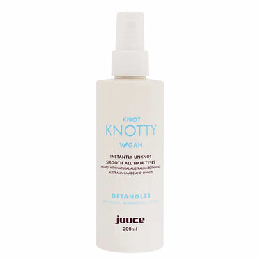 JUUCE Knot Knotty is a lightweight detangling mist designed to effortlessly smooth knots while preventing breakage, splitting, and snapping