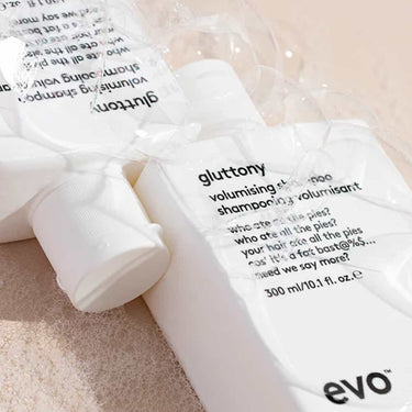 Give your hair a boost of body and texture with Evo Gluttony Volumising Shampoo. Packed with protein and film formers, this lightweight yet powerful formula builds volume while gently cleansing without stripping essential moisture
